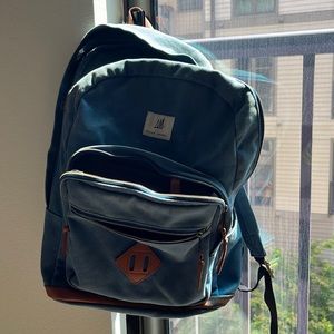 Status Anxiety backpack: blue , good condition. All zippers work!